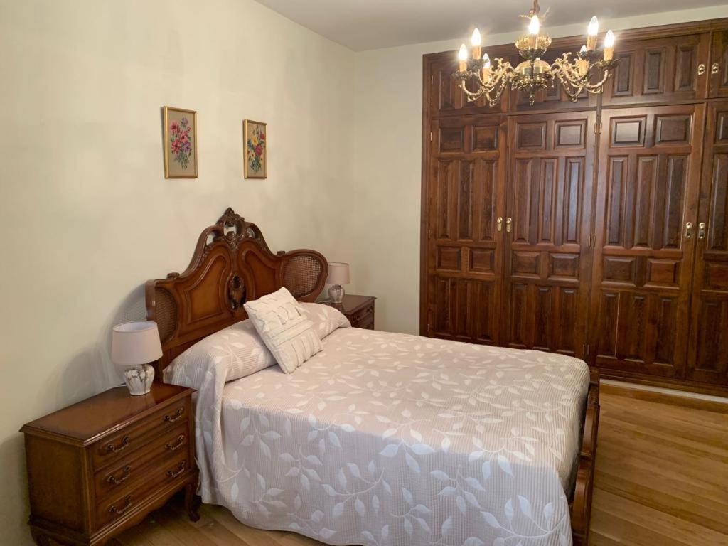 Postel nebo postele na pokoji v ubytování Rincón de Ayllon
