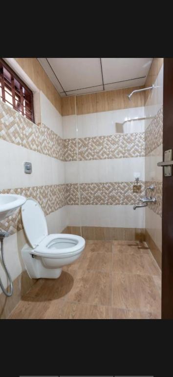 Koupelna v ubytování Masterkey Deluxe Rooms