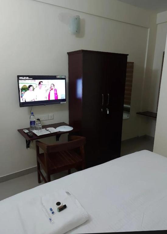 TV a/nebo společenská místnost v ubytování Masterkey Deluxe Rooms