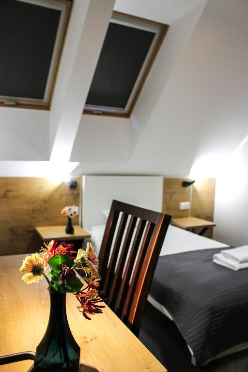 Posteľ alebo postele v izbe v ubytovaní Hotel Regina