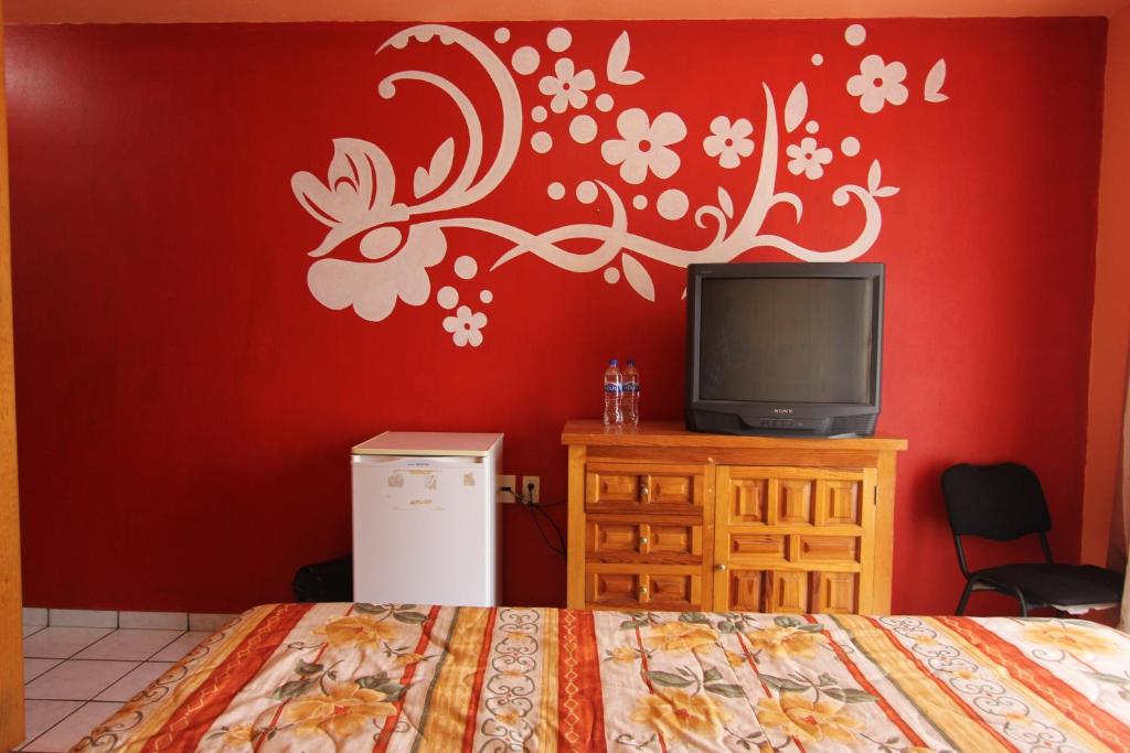 TV a/nebo společenská místnost v ubytování Hotel Real de la Sierra