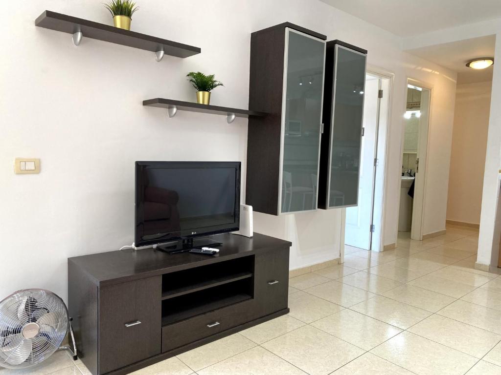 TV a/nebo společenská místnost v ubytování Apartamentos Medano - La Ladera
