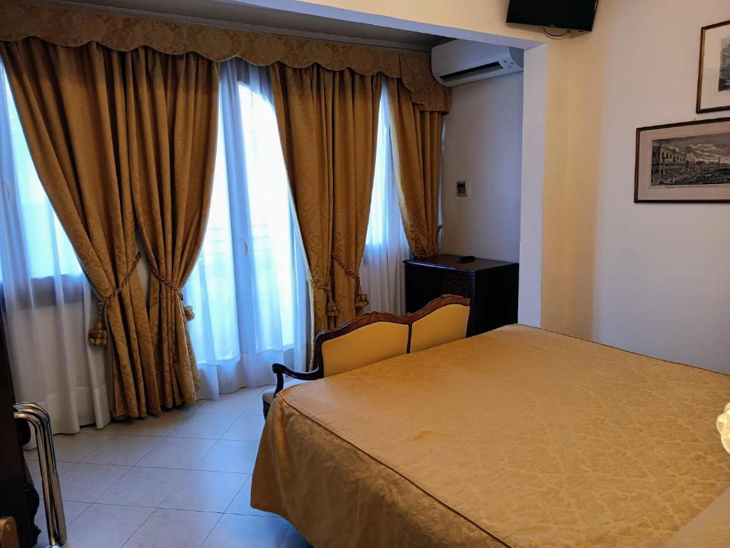 Postel nebo postele na pokoji v ubytování Hotel Scandinavia - Relais