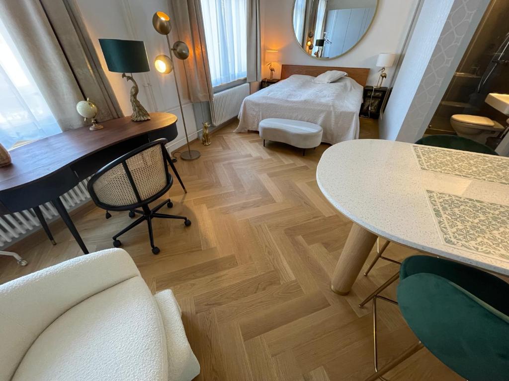 Postel nebo postele na pokoji v ubytování Exclusive one room apartment next to Zürich main station