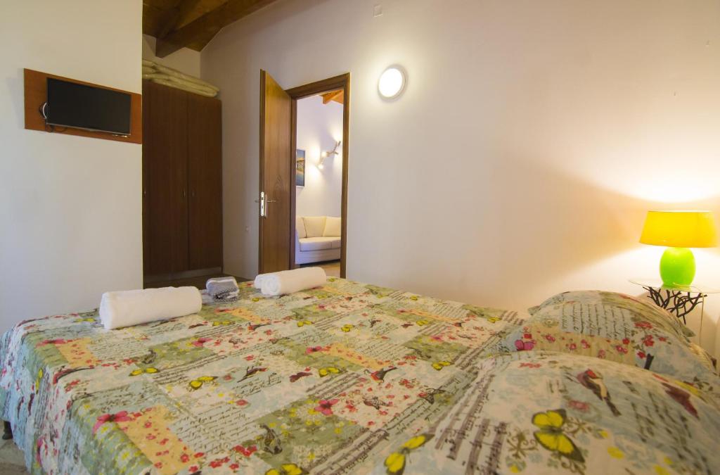 Posteľ alebo postele v izbe v ubytovaní Su La Strata Villa by CorfuEscapes