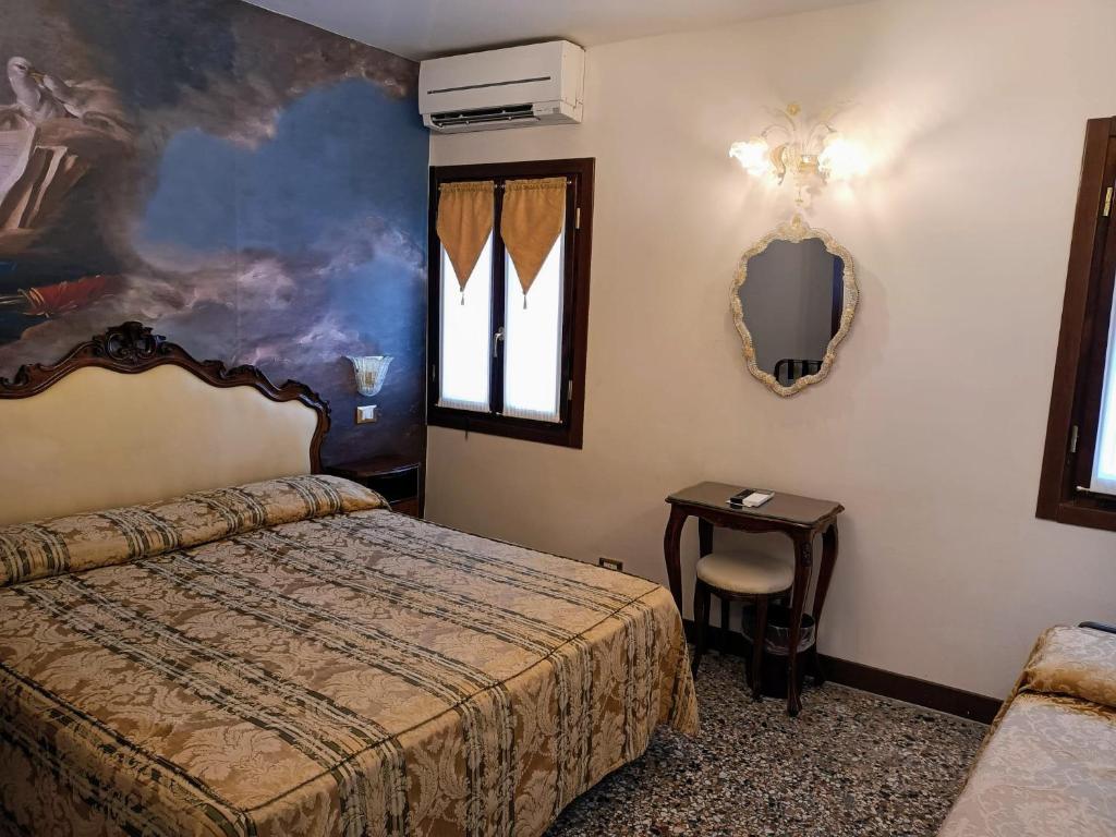 Postel nebo postele na pokoji v ubytování Hotel Scandinavia - Relais