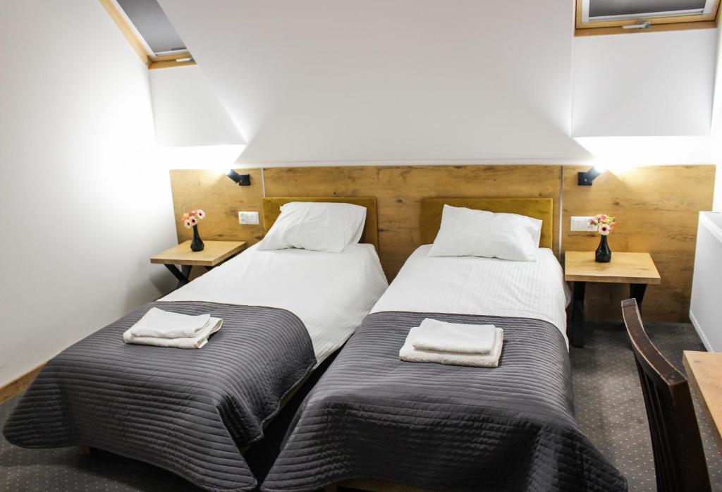 Posteľ alebo postele v izbe v ubytovaní Hotel Regina