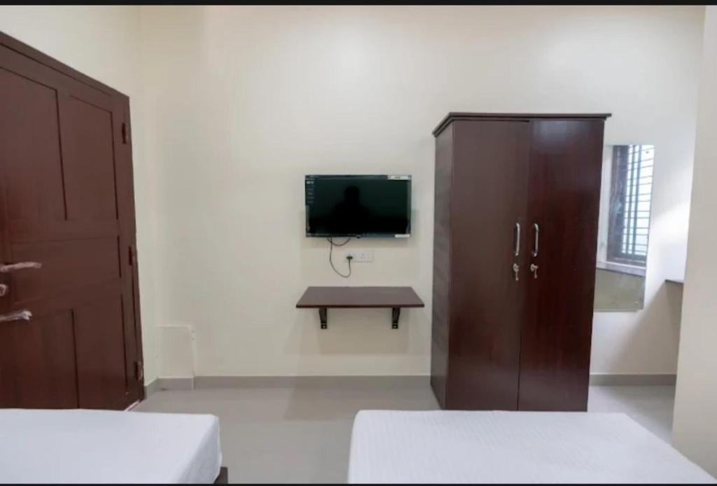 TV a/nebo společenská místnost v ubytování Masterkey Deluxe Rooms