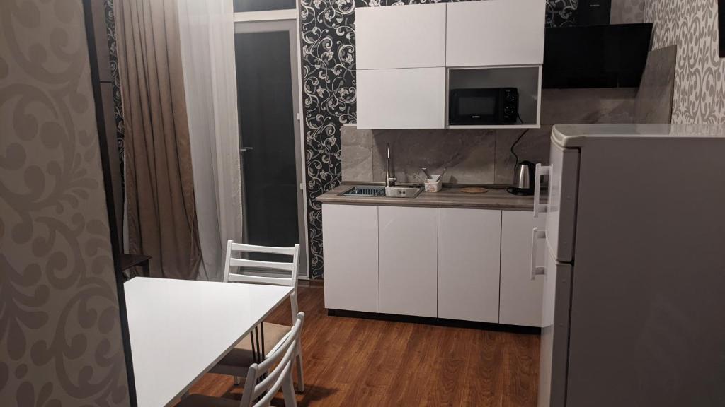 Kuchyň nebo kuchyňský kout v ubytování Tirkius House
