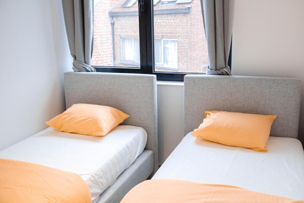 Postel nebo postele na pokoji v ubytování K&Y suites 2 Brussels airport 500m!