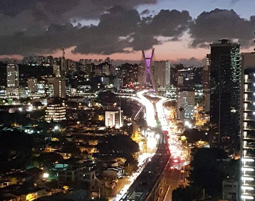 a city lit up at night with at Apartamento Brooklin, próximo ao metrô Campo Belo in São Paulo