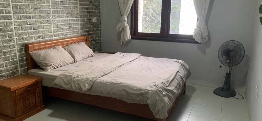 Postel nebo postele na pokoji v ubytování HomesHue