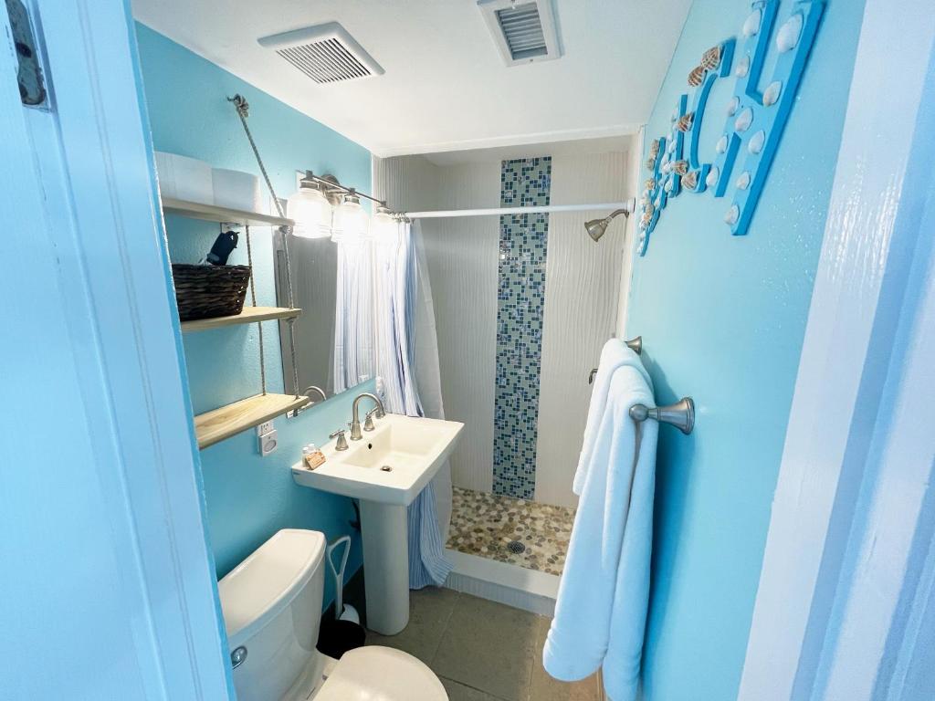 A bathroom at Cozy Canaveral Cottages
