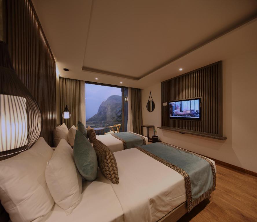 TV a/nebo společenská místnost v ubytování HIDE ELLA Hotel & Resort
