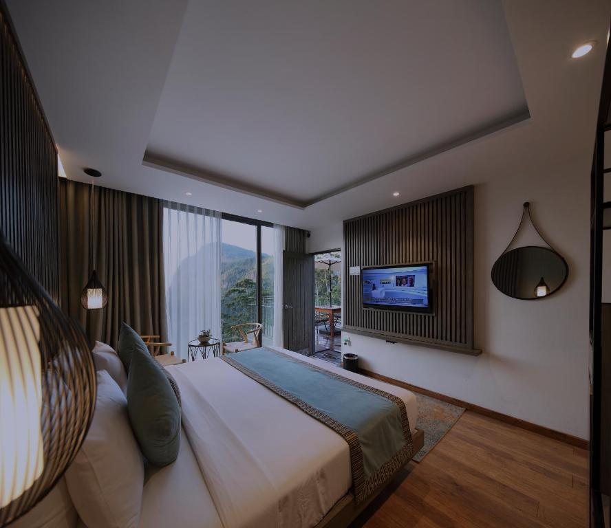 TV a/nebo společenská místnost v ubytování HIDE ELLA Hotel & Resort