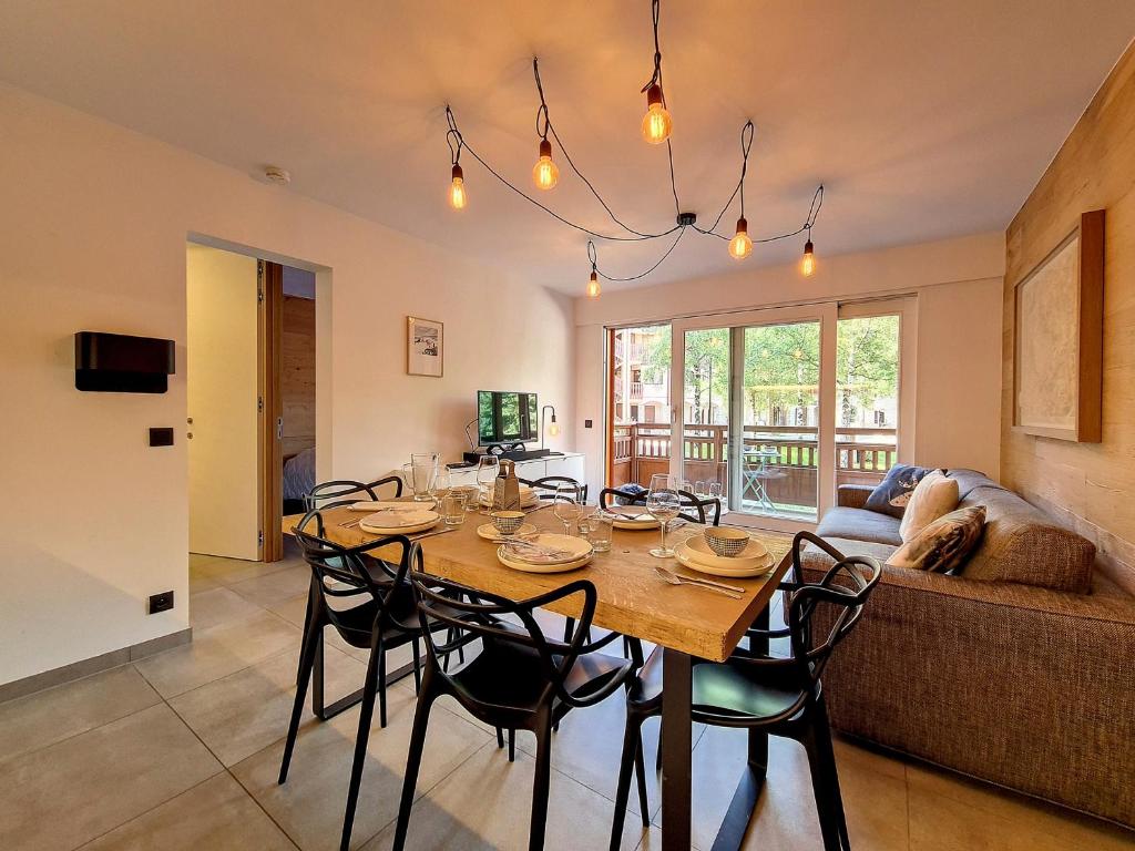 Posezení v ubytování Appartement moderne 2P · 6 pers · Proche des pistes · Balcon-Sud/Ouest - FR-1-344-819