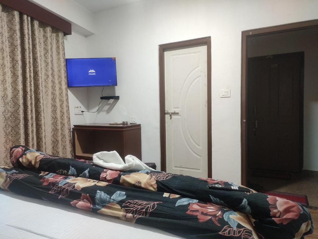 TV a/nebo společenská místnost v ubytování Sikkimese Inn