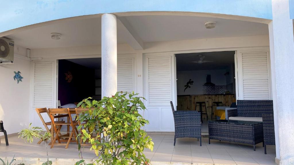 Patio nebo venkovní prostory v ubytování Indigo, Anse Mitan, beau F2 sublime vue mer, proche plage