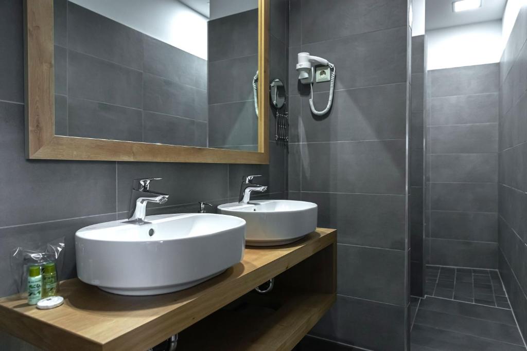 Koupelna v ubytování Oliva Hotel