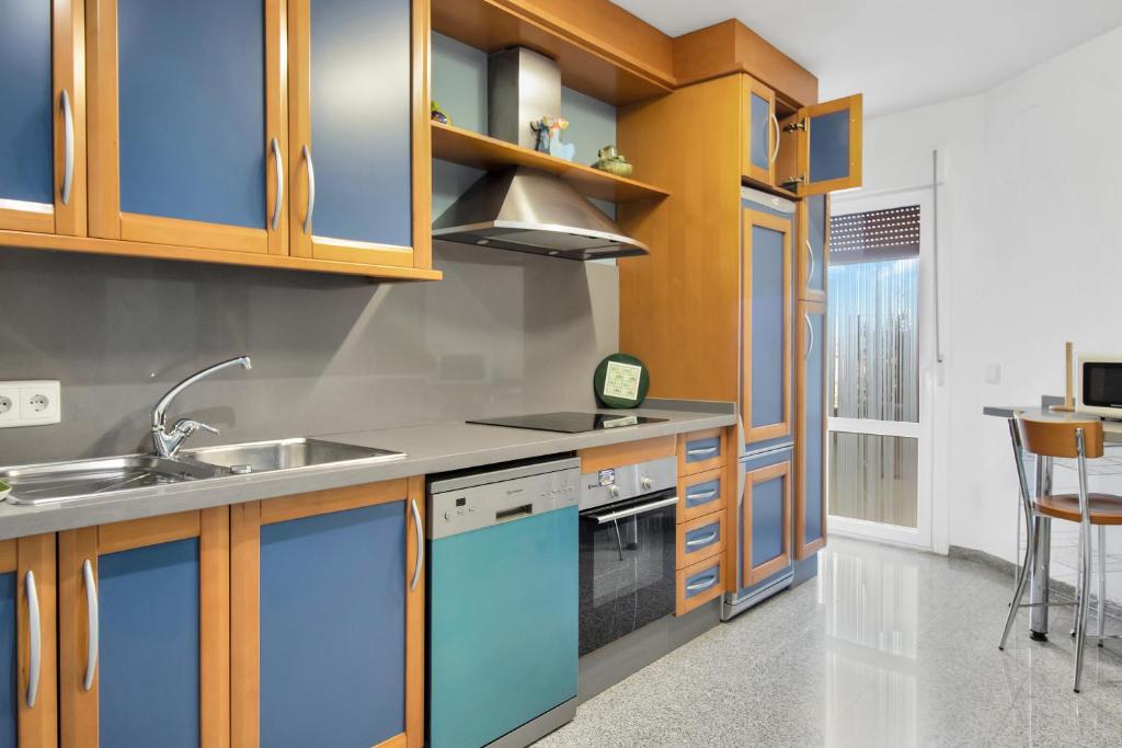 Kuchyňa alebo kuchynka v ubytovaní Apartamento Resil Ronda