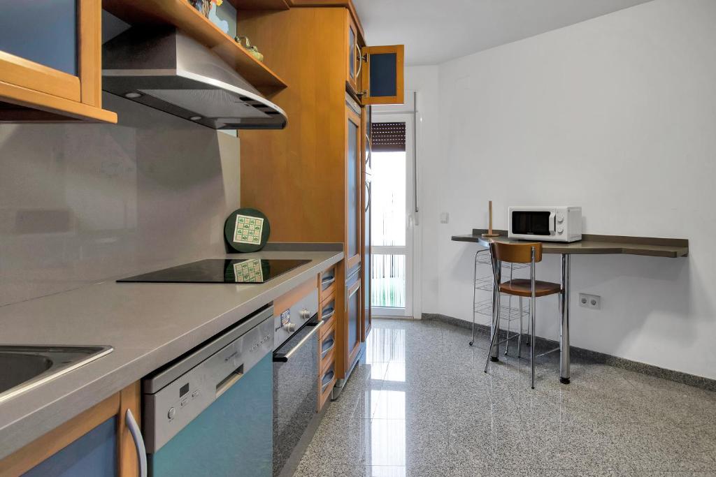 Kuchyňa alebo kuchynka v ubytovaní Apartamento Resil Ronda