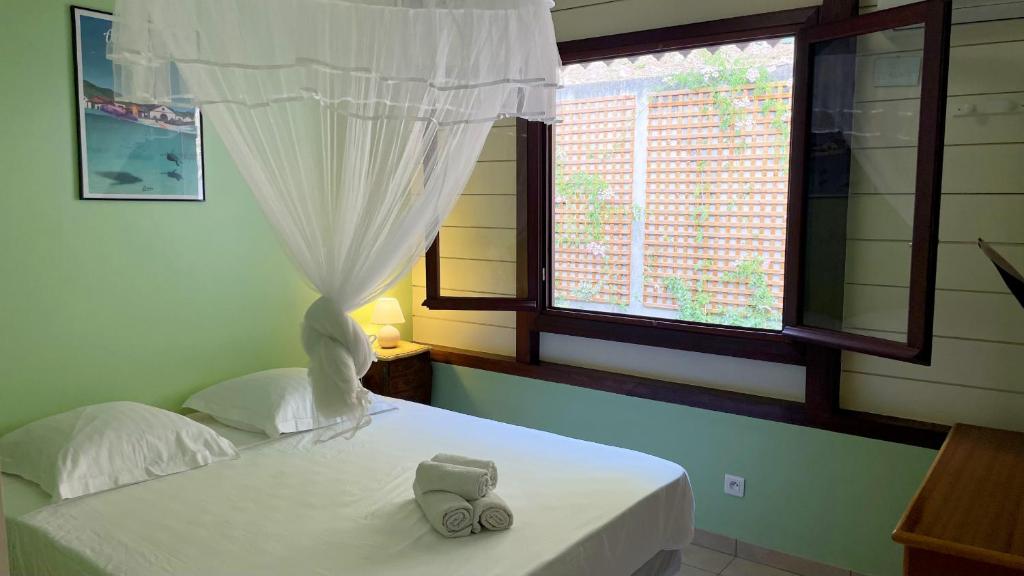 Postel nebo postele na pokoji v ubytování Villa de charme avec piscine et magnifique vue mer