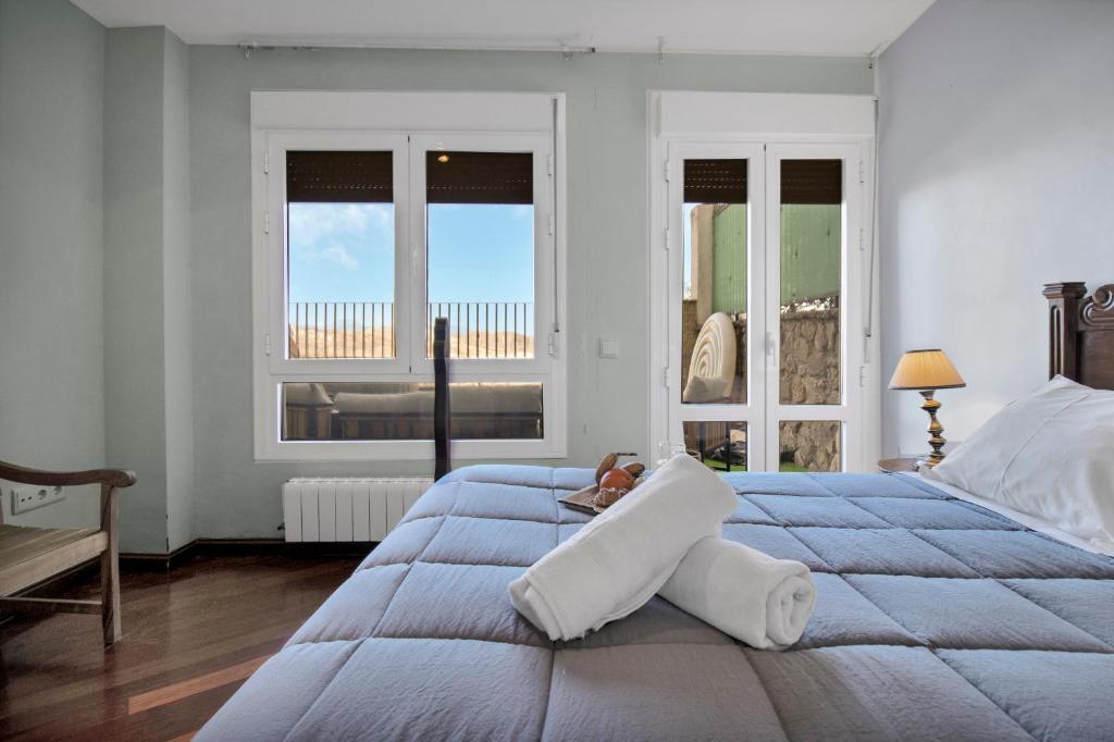 Posteľ alebo postele v izbe v ubytovaní Apartamento Resil Ronda