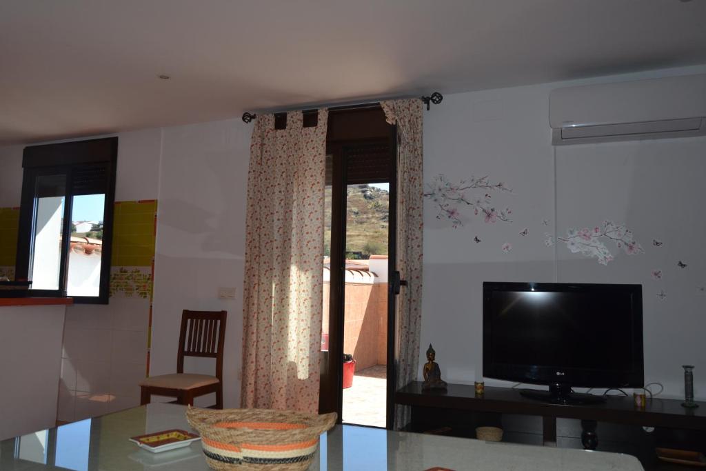 TV a/nebo společenská místnost v ubytování Apartamento la alberca 3