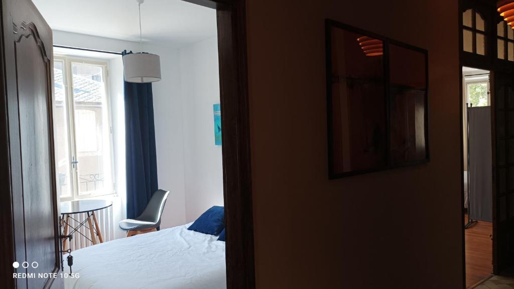 Postel nebo postele na pokoji v ubytování FLORAC AUTHENTIQUE