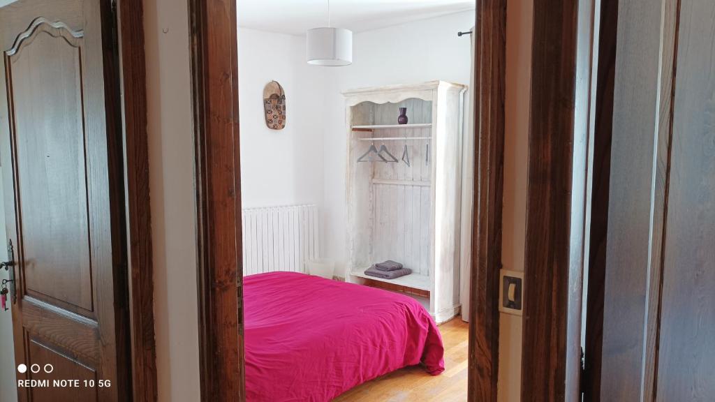 Postel nebo postele na pokoji v ubytování FLORAC AUTHENTIQUE