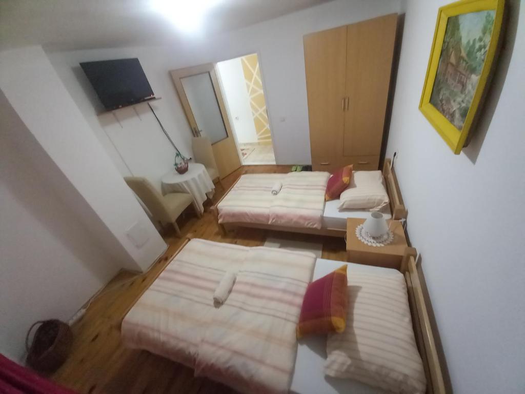Ліжко або ліжка в номері Sobe dujakovic