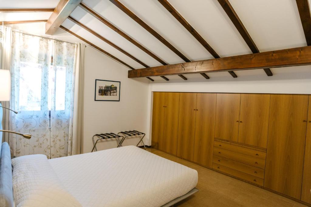 Łóżko lub łóżka w pokoju w obiekcie B&B Spina Verde