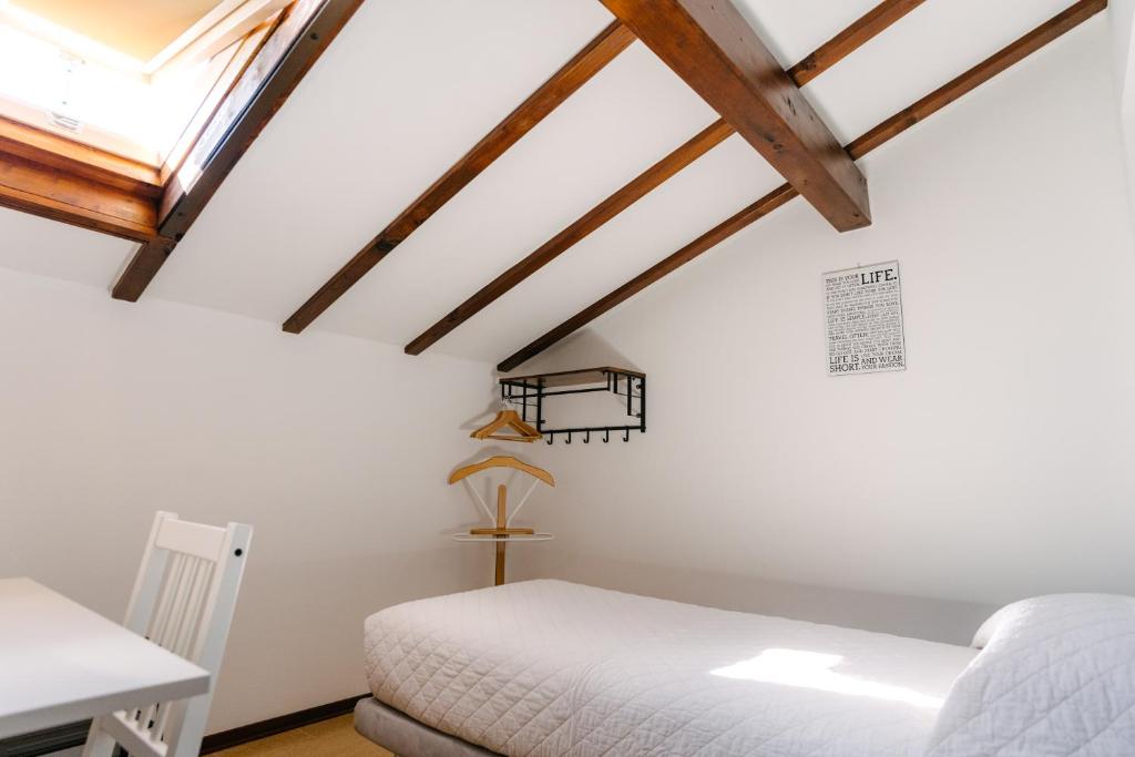 Łóżko lub łóżka w pokoju w obiekcie B&B Spina Verde