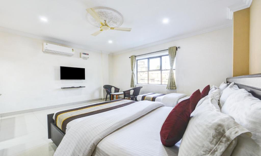 TV a/nebo společenská místnost v ubytování PLEASANT STAYS Hotel