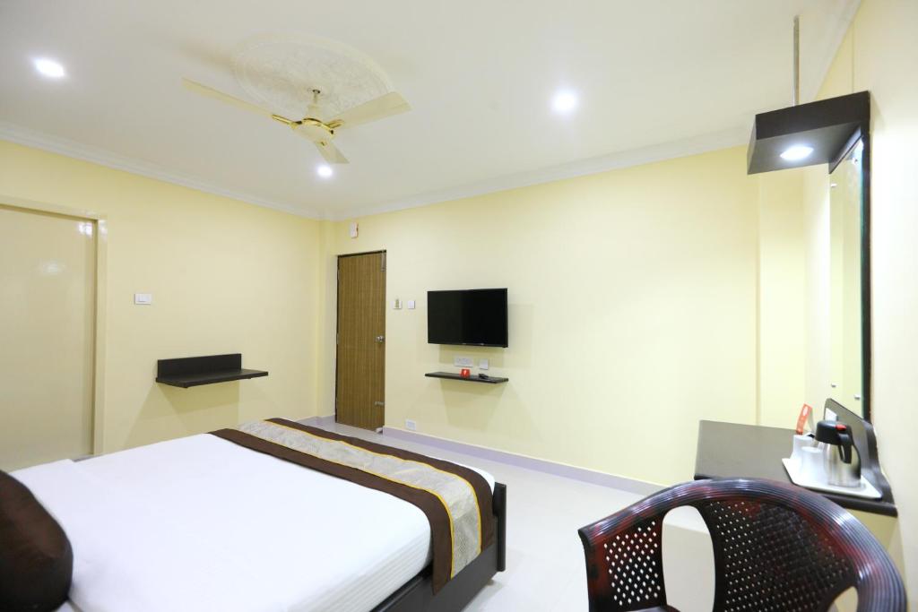 TV a/nebo společenská místnost v ubytování PLEASANT STAYS Hotel