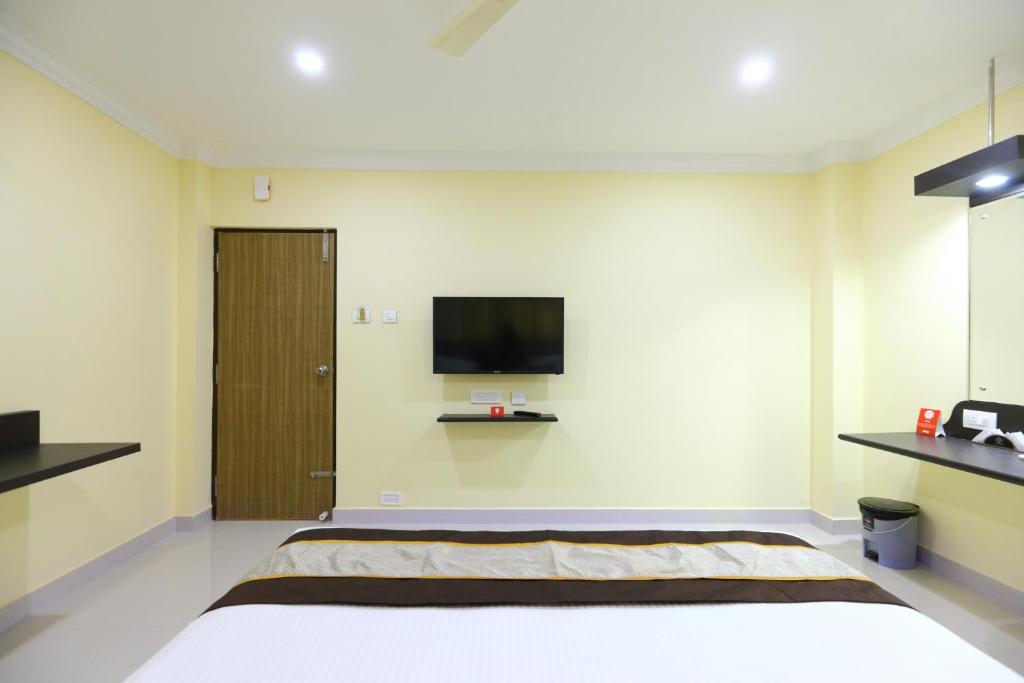 TV a/nebo společenská místnost v ubytování PLEASANT STAYS Hotel