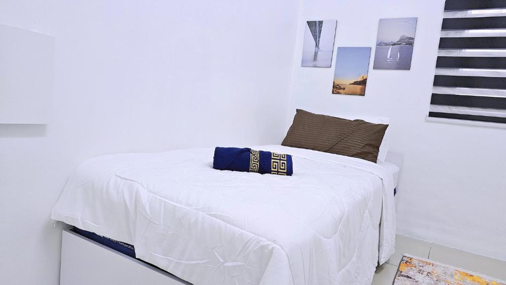 Postel nebo postele na pokoji v ubytování Homestay By MSH