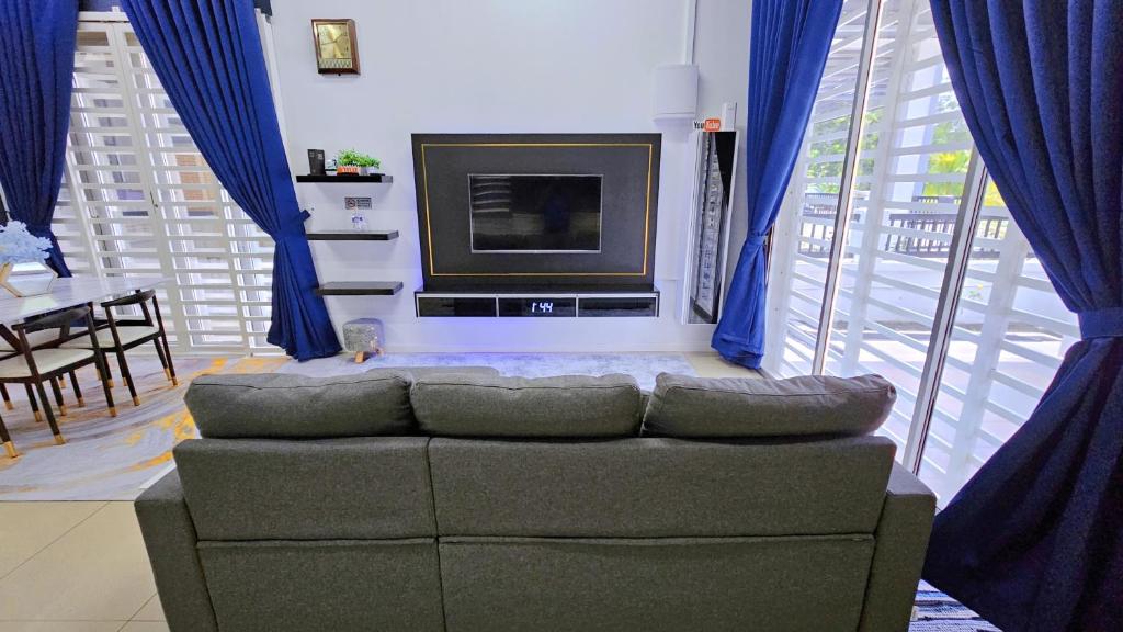 TV a/nebo společenská místnost v ubytování Homestay By MSH