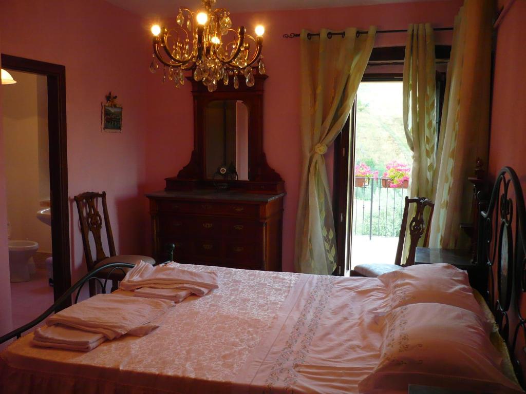 Posteľ alebo postele v izbe v ubytovaní Agriturismo Biologico la Casa degli Gnomi