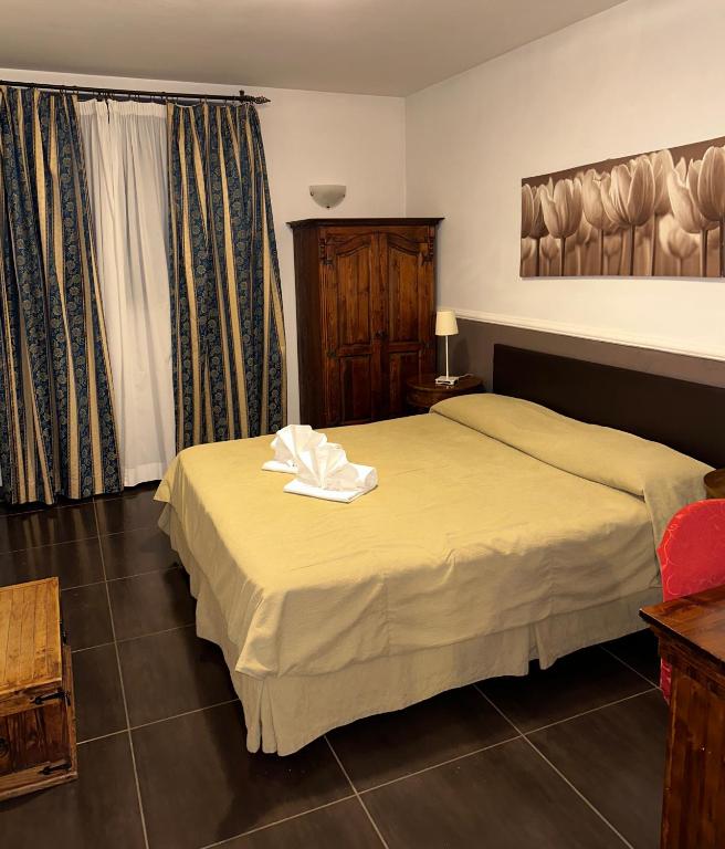 Postel nebo postele na pokoji v ubytování Park Hotel Serenissima