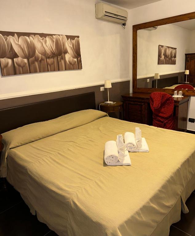 Postel nebo postele na pokoji v ubytování Park Hotel Serenissima
