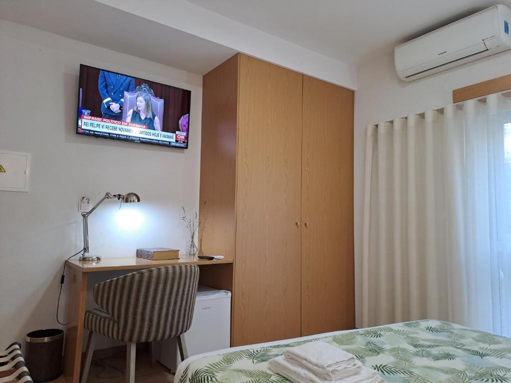 Ein Bett oder Betten in einem Zimmer der Unterkunft Hotel SQUARE