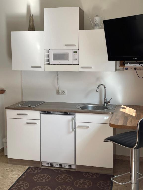 Kuchyňa alebo kuchynka v ubytovaní Wein4tel-Apartments