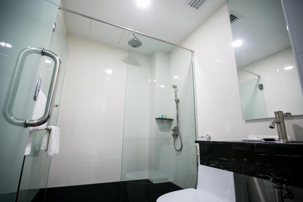 Koupelna v ubytování Belllo Hotel JB Central