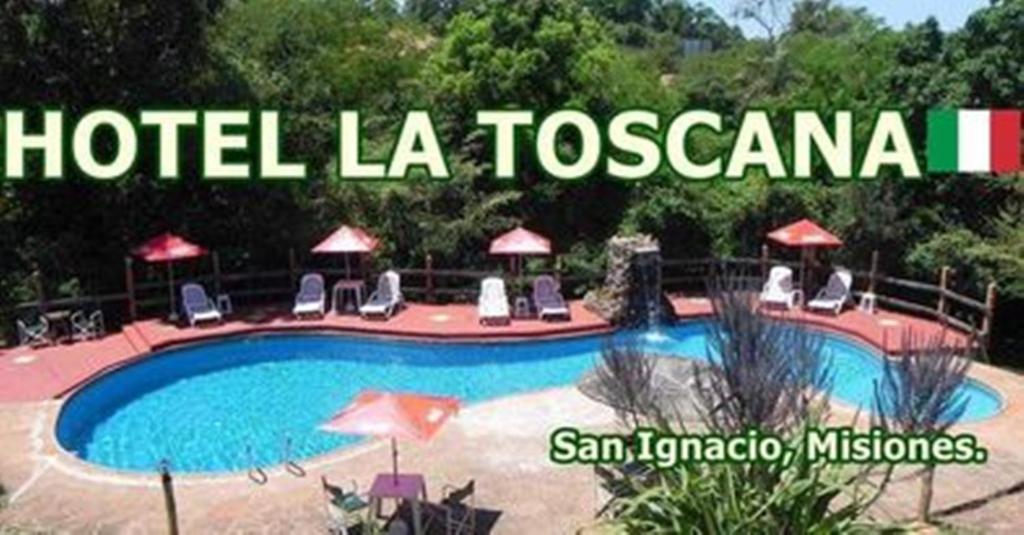 聖伊格納西奧的住宿－HOTEL LA TOSCANA，读拉托斯卡纳酒店的一个标志