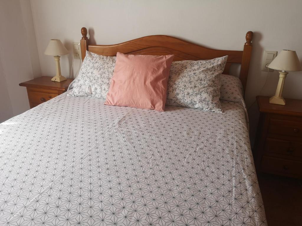 Postel nebo postele na pokoji v ubytování Casa Dolors