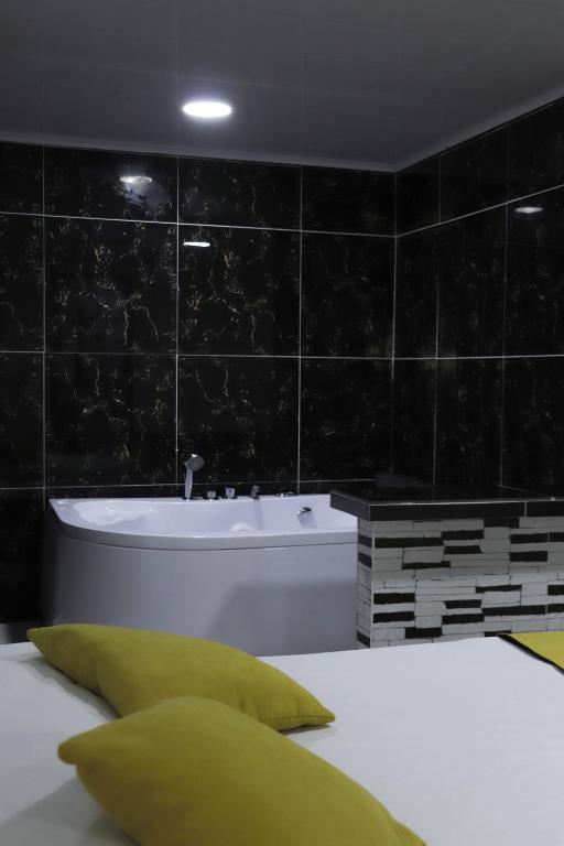 Koupelna v ubytování Hosteria La Medusa
