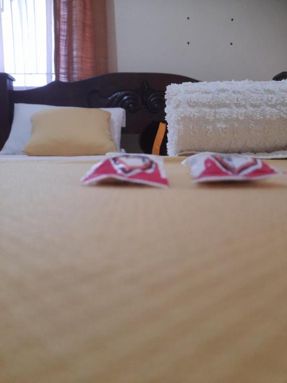 Postel nebo postele na pokoji v ubytování Bamburi BnB