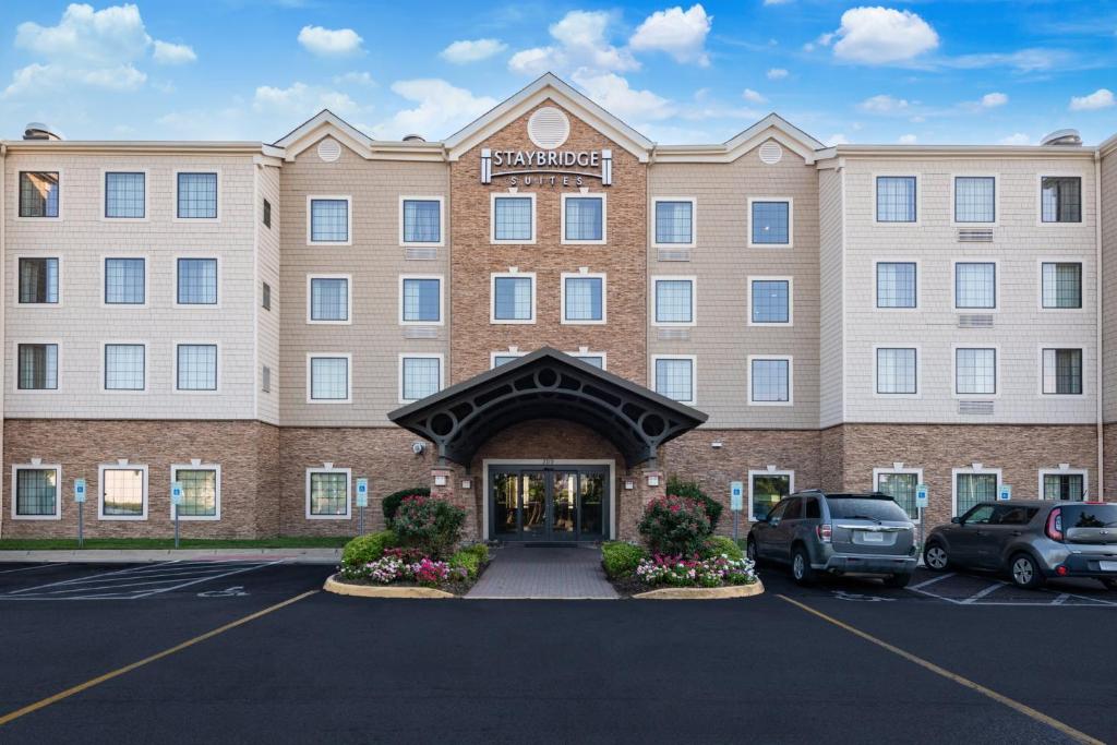 a rendering of a hotel with a parking lot at Staybridge Suites Chesapeake-Virginia Beach, an IHG Hotel in Chesapeake