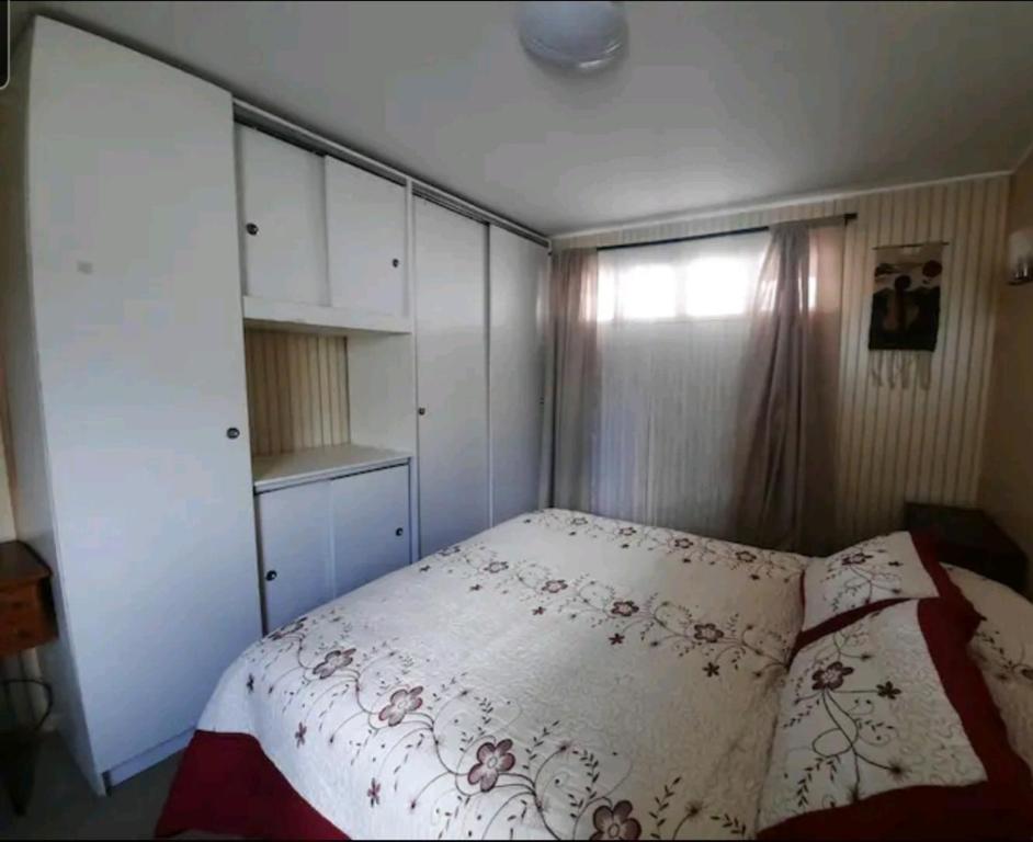 Tempat tidur dalam kamar di MARGOT
